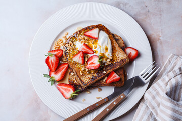 French toast with strawberries and passion fruit.