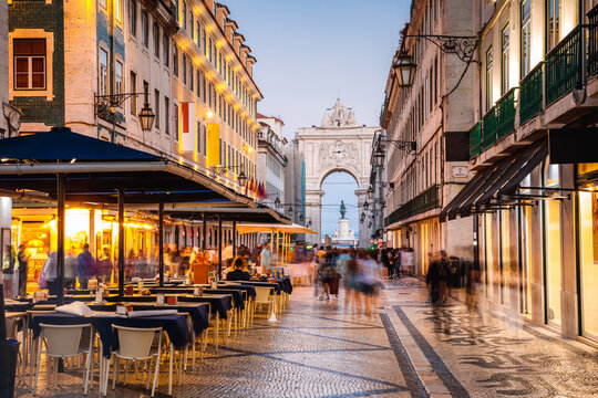 Tourists in the city center of Lisbon at night, Portugal