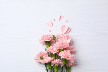 Beautiful bouquet of pink carnations on a white background