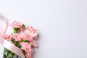 Beautiful bouquet of pink carnations on a white background