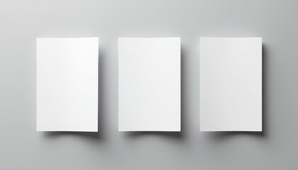 Three Blank White Paper Cards Mockup on Gray Background