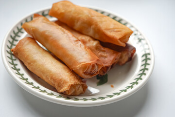 Fried spring rolls or Popiah Goreng, crispy fried spring roll filled with vegetables, meat or prawns, offering a crunchy delight. Usually served for breakfast or afternoon tea.