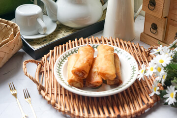 Fried spring rolls or Popiah Goreng, crispy fried spring roll filled with vegetables, meat or...