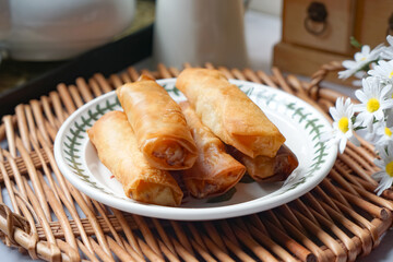 Fried spring rolls or Popiah Goreng, crispy fried spring roll filled with vegetables, meat or prawns, offering a crunchy delight.  Usually served for breakfast or afternoon tea.
