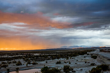 Sunset in rainy Bolivia prairie. Road to La-Paz, Bolivia