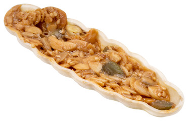Caramel peanut slices snack with almond slices, melon seeds, sesame seeds, caramel syrup, white sugar and mix nut isolate on white PNG file.