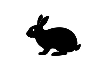 Obraz premium A simple black silhouette of a rabbit, showcasing its side profile with ears perked up, isolated on a transparent background