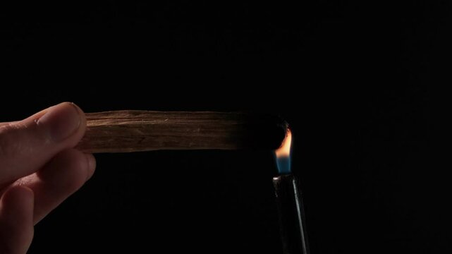 Palo Santo burning ritual magic sticks. Wellness with aromatherapy and the occult. Healing incense Palo Santo.