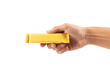 Male hand holding yellow snack bar mockup isolated no background cutout