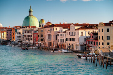 Grand Canal and Church of Santa Maria della Salute at sunrise, Venice, Italian city.