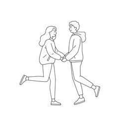 Young couple holding hands and jumping joyfully on a white background  