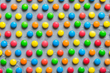 colorful candies as background top view. Seamless pattern with candy. Many sweet candies close-up