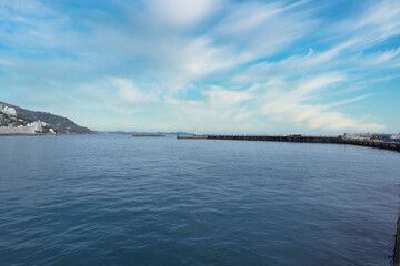 The sea, sky, and breakwater of Atami City