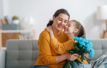 daughter and mom with flowers