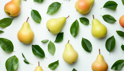 Obraz premium Fresh pears and green leaves on white background