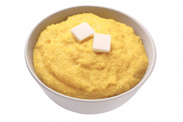 Cooked cornmeal polenta with butter in white ceramic bowl isolated on white.