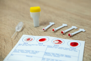 Blood typing test card with Anti-A, Anti-B, Anti-D result, diagnostics and health awareness,...
