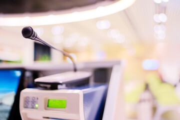 Professional Microphone in Modern Office Setting With Bright Blurred Background