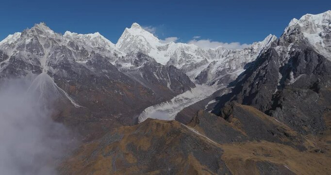 Panoramic drone shot of glaciers and snowy mountains of Kangchenjunga, Nepal
