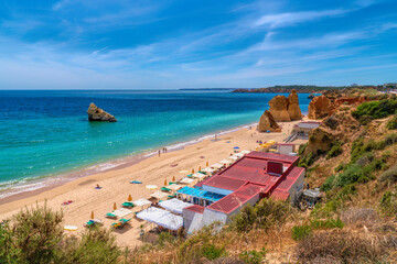 Portimao cafe and coast three castles beach The Algarve Portugal
