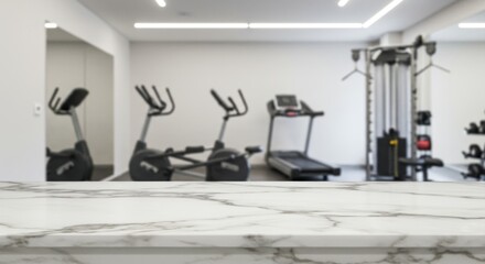 Fototapeta premium Modern Gym Interior with Marble Counter - Clean, modern gym interior with exercise equipment blurred in the background