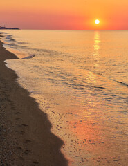 Sunrise Over Coastal Cliffs and Beach