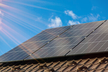 Solar panels on the roof of the house. Selective focus.