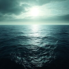 Fototapeta premium Vast ocean, sun, moody sky