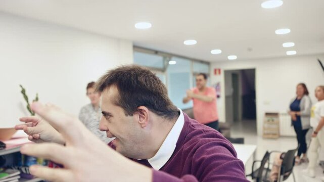 Adults with mental disabilities engaging in activities at a residence