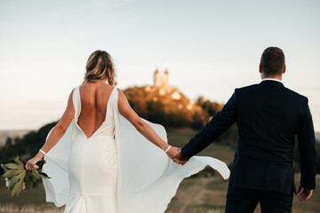 Hand in hand, they walk through fields of promise, with the Calvary standing tall before them....