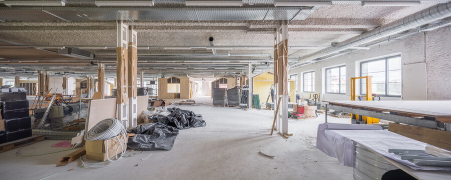 Renovation of expansive industrial space with exposed features