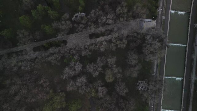 Almaty, Kazakhstan - 04.04.2025 : The river is in the center of the city. Different architecture. The view from the drone. Spring time.