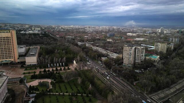 Almaty, Kazakhstan - 04.04.2025 : The river is in the center of the city. Different architecture. The view from the drone. Spring time.