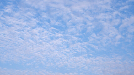 Clouds sky background. Abstract background of white cloud texture.  Blue sky, softness, pastel, nature, cozy day, minimal, heaven, morning vibe concept for wallpaper. Beautiful sky and fluffy cloud.