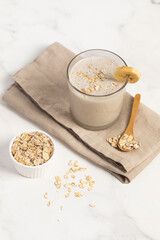 Banana Smoothie with Oats, Healthy Food, Vegan or Vegetarian Diet Food Concept
