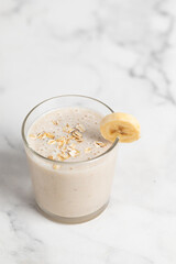 Banana Smoothie with Oats, Healthy Food, Vegan or Vegetarian Diet Food Concept