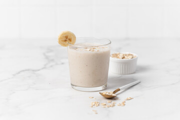 Banana Smoothie with Oats, Healthy Food, Vegan or Vegetarian Diet Food Concept