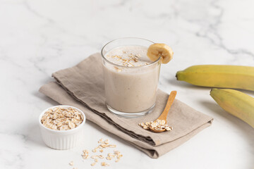 Banana Smoothie with Oats, Healthy Food, Vegan or Vegetarian Diet Food Concept