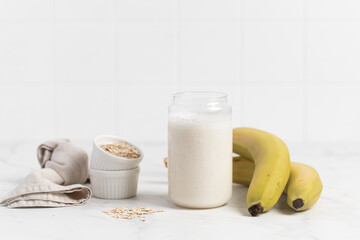 Banana Smoothie with Oats, Healthy Food, Vegan or Vegetarian Diet Food Concept