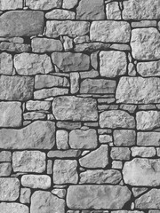 Wall of natural stone of gray color. Vector illustration. Sketch for creativity.