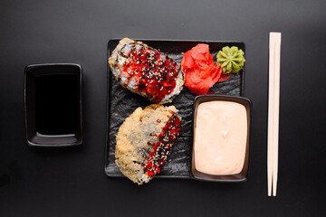 Delicious crispy sushi rolls served with wasabi and ginger