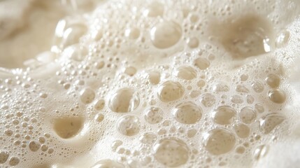 Beer head texture forming a foamy surface with many bubbles