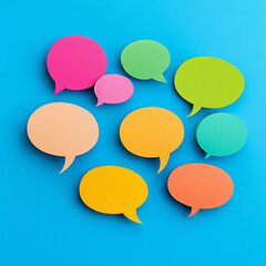 several speech bubbles in different colors on a blue background. icons and remarks. Free space for text or image. Concept of online communication or communications