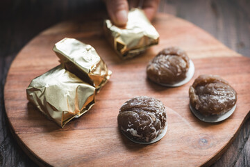 Traditional Marron Glacé – Candied Chestnuts on Wood in Close-Up View