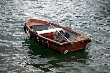 Close-up of a small, weathered fishing boat