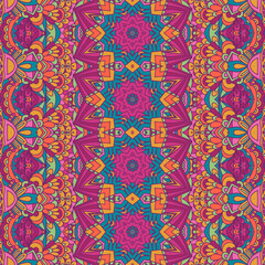 Ethnic tribal festive pattern for fabric. Abstract geometric colorful seamless pattern ornamental. Mexican psychedelic vivid design.