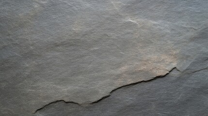 Dark gray slate stone texture with natural cracks