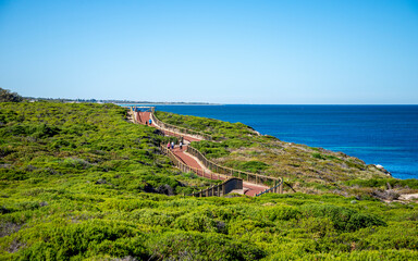 Scenic Coastal Pathway With Greenery and Ocean in Bright Sunlight at Iluka, Perth, Australia, March 2020