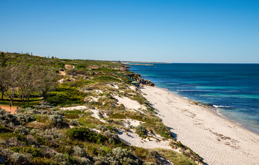 Scenic Coastal Landscape with Sandy Beach and Blue Ocean Waters at Iluka foreshore, Perth, Australia, March 2020
