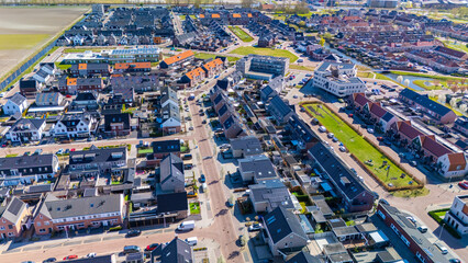 This vibrant Dutch suburban area features newly built modern family homes and townhouses, emphasizing sustainable living with solar power solutions. Ideal for families seeking comfort in Europe.